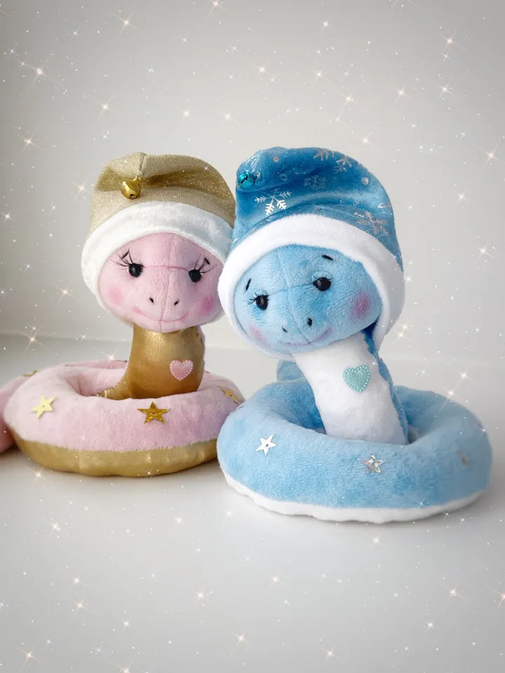 Christmas plush snakes. Handmade cute snakes in holiday hat for home decor. Christmas snakes for gift.