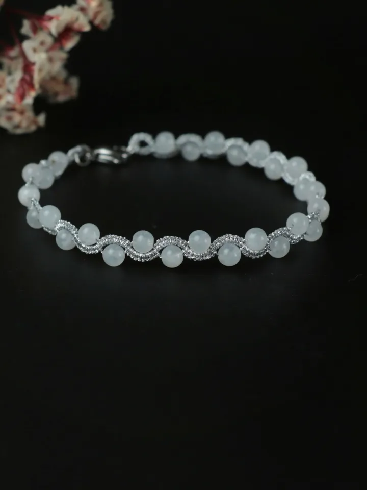 Braided bracelet from metallic thread