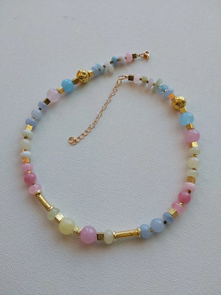 Choker, necklace, beads made of natural stones. Beryl and volcanic lava, tinted in the color "gold". 43-50 cm.