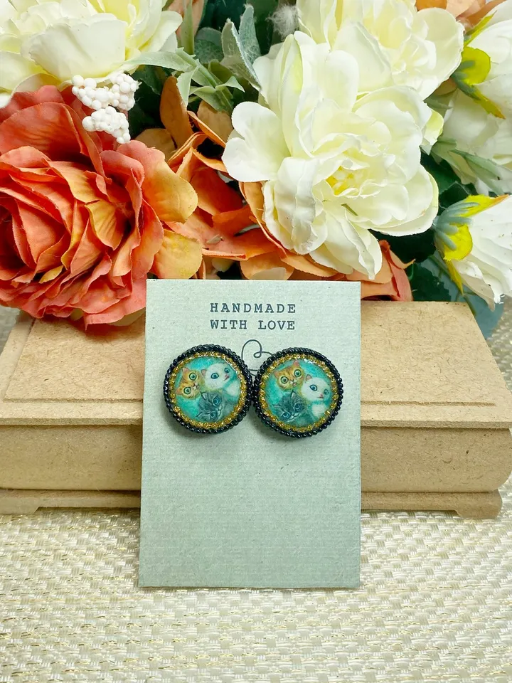 Handmade stud earrings. Earrings with images of cats.
