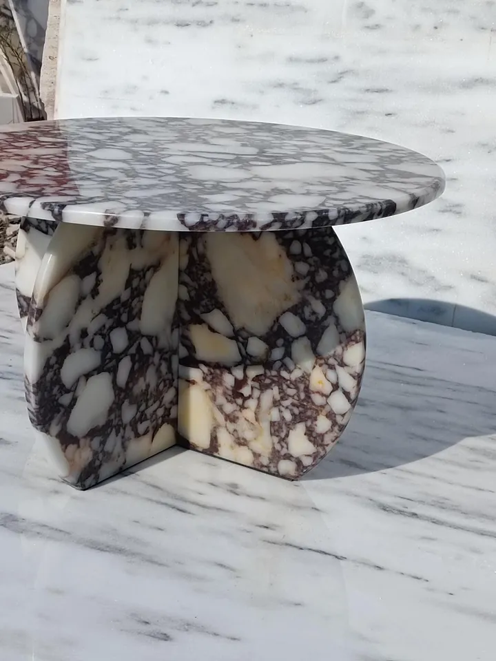 Calacatta Viola Coffee Table is Real Marble and everything is marble, including the Italian model handmade legs.