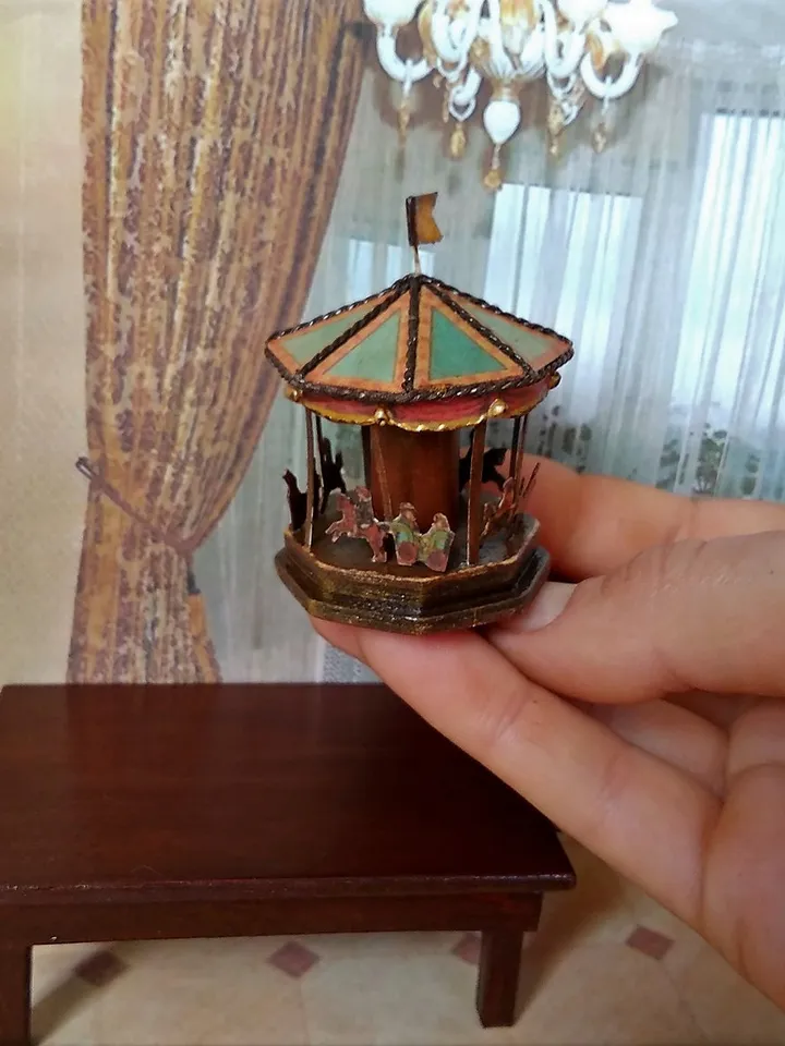 Miniature carousel. Dollhouse miniature.1:12 scale.