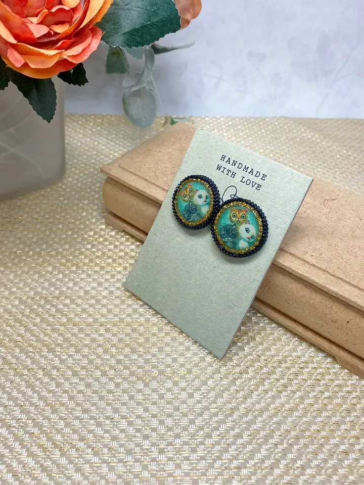 Handmade stud earrings. Earrings with images of cats.