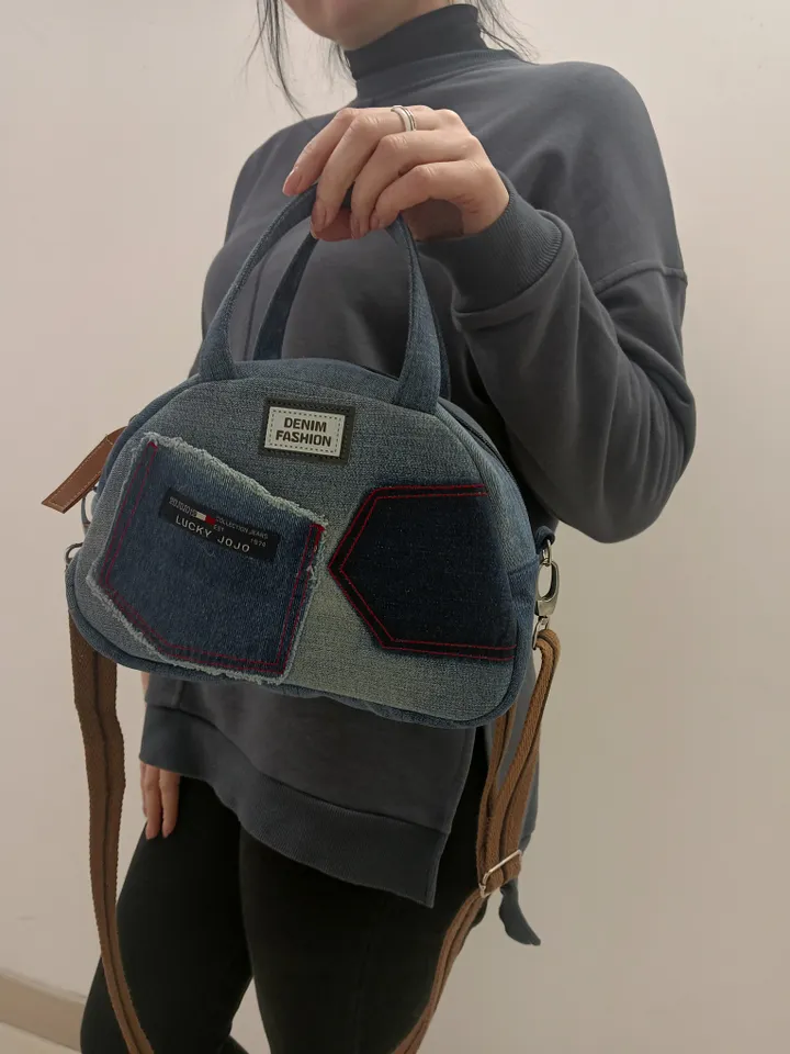 Cute denim shoulder or crossbody bag made of recycled jeans.
Nice denim Boston bag, on a belt, with 5 pockets, crossbody or shoulder, light only 275 grams, the strap is detachable. you will not see such a bag anywhere else. size 26 * 18 * 11 cm.