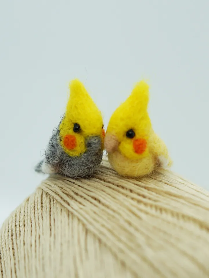 A pair of tiny needle felted miniature cockatiels, made to order