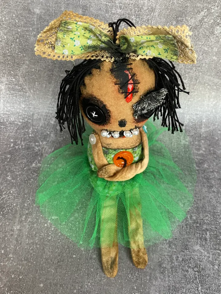Creepy doll . Halloween home decor. Shelf decor.