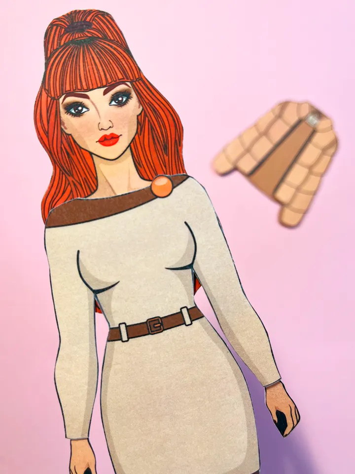 Paper doll in autumn clothes