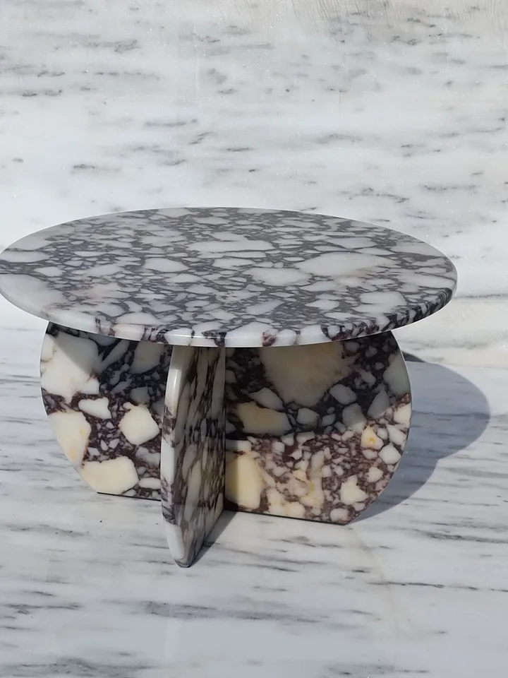 Calacatta Viola Coffee Table is Real Marble and everything is marble, including the Italian model handmade legs.