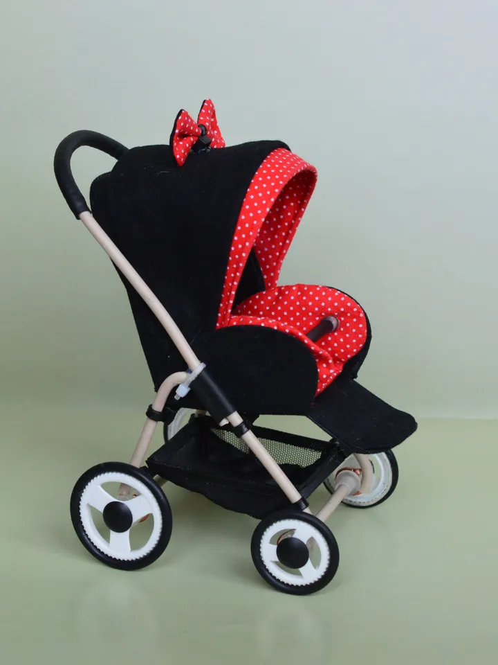 Miniature toy stroller for dolls in 1/6 scale. Accessories for small dolls and poupins. Pram for Barbie doll.