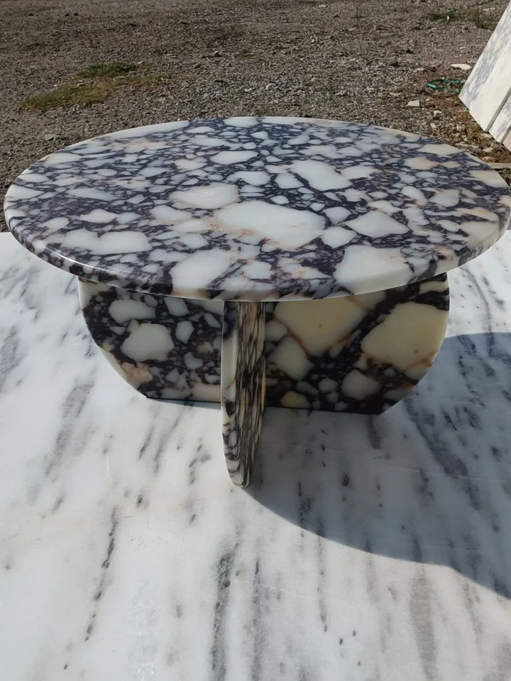 Calacatta Viola Coffee Table is Real Marble and everything is marble, including the Italian model handmade legs.