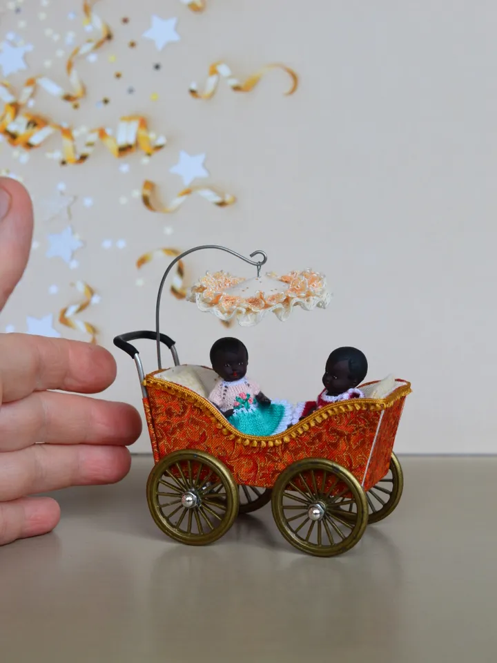 Miniature toy stroller for two small dolls. Handmade miniature stroller for small dolls.