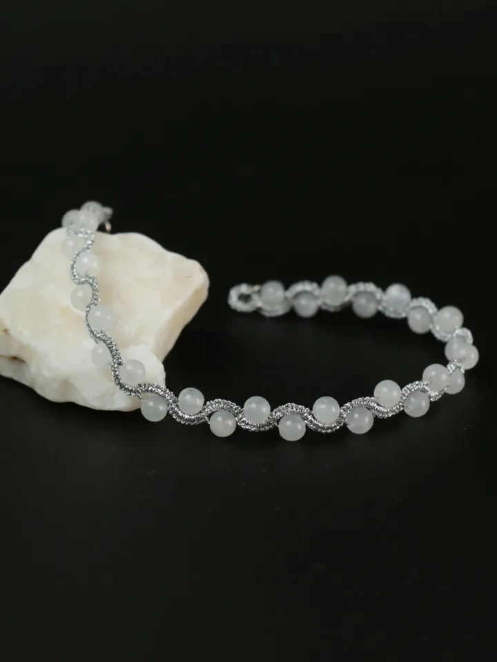 Braided bracelet from metallic thread