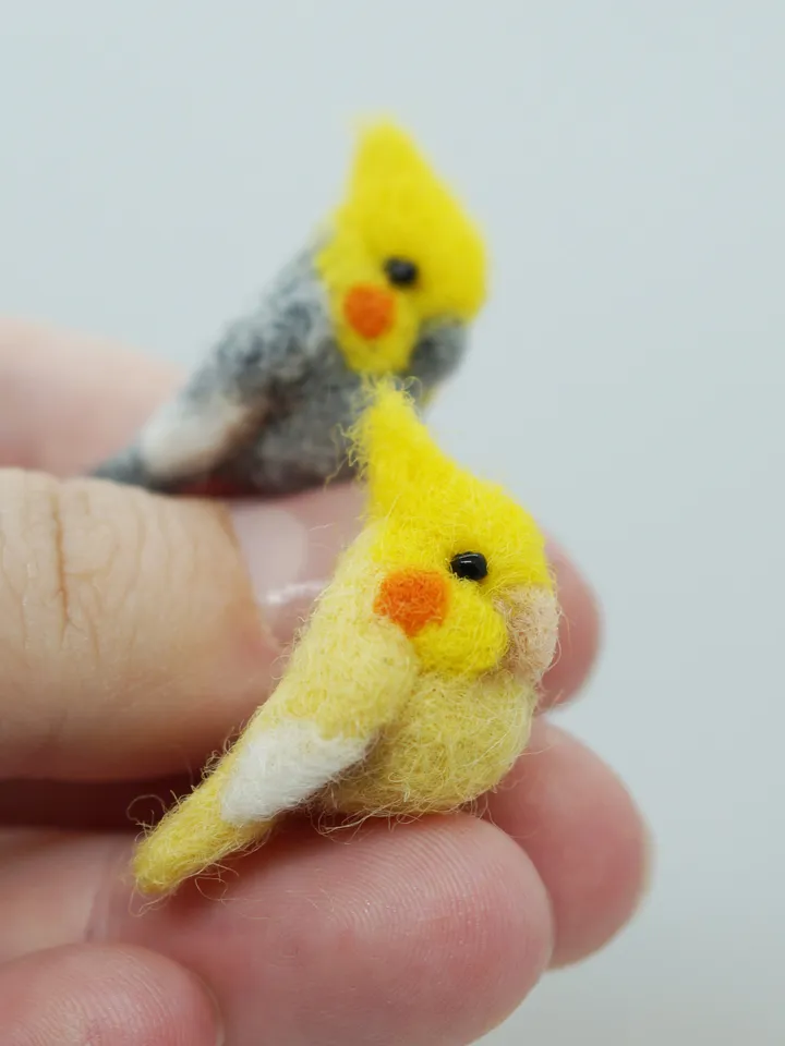 A pair of tiny needle felted miniature cockatiels, made to order