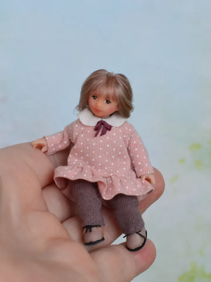 Miniature doll child in 12th scales