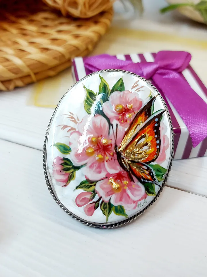 Brooches for women: A delicate butterfly on wild rose blossoms mother of pearl pin, hand painted pink floral brooch made from shell