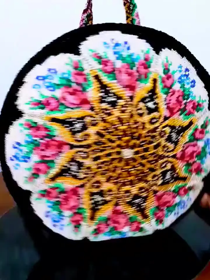 Flower crochet round bag Art to wear purse Handmade black white Crochet backpack Macrame shoulder straps Crochet festival bag Wayuu style