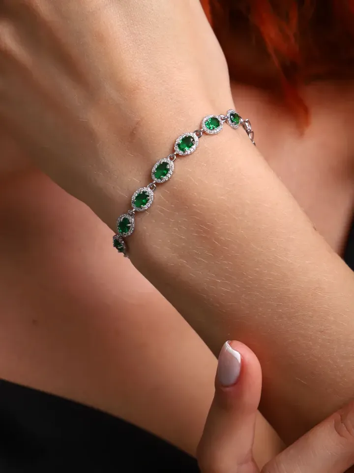 Women's silver bracelet 925 with emerald crystals and cubic zirconia
