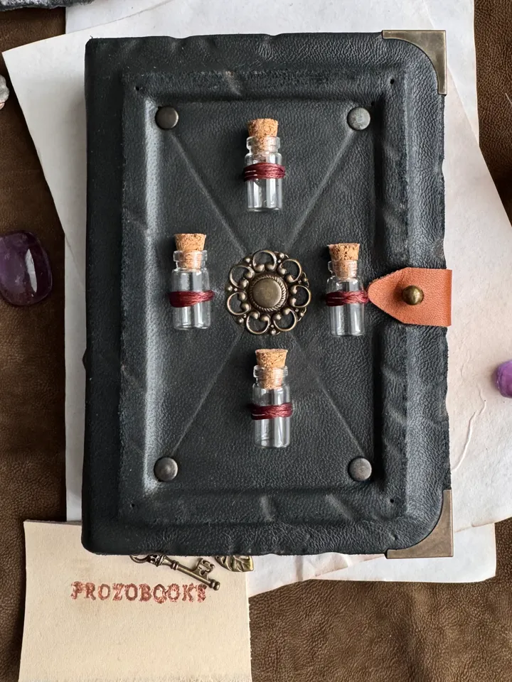 Genuine leather notebook with mini bottles on the cover. Grimoire, book of shadows, magical herbalist.