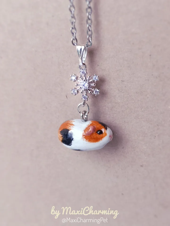 a Handmade guinea pig necklace rundom color  (pre-order)