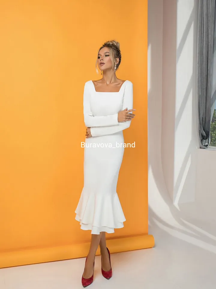 Made to order White dress with a flounce at the bottom