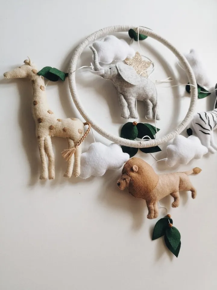 Safari mobile baby nursery decor crib