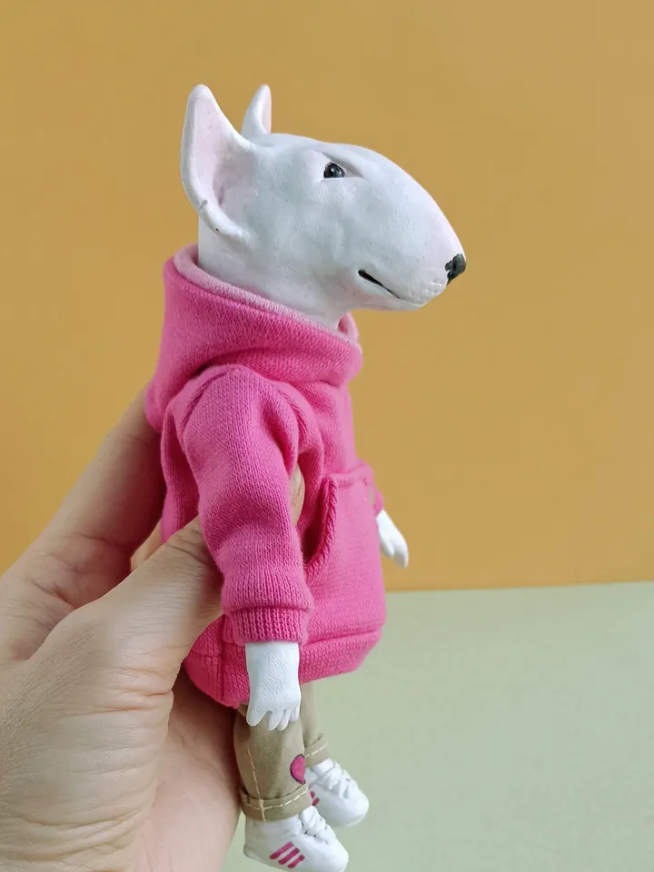 Bull Terrier doll in a pink sweater