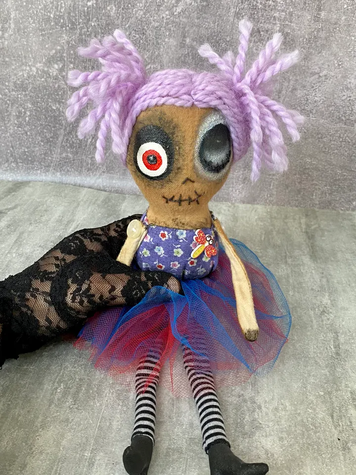 This handmade, Creepy Doll is the memorable gift for that special someone this Halloween.