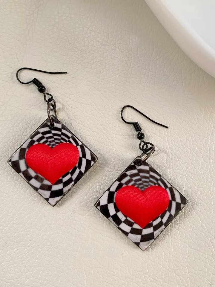 Bright handmade earrings. Handmade jewelry. Author's design. Earrings with bright hearts.