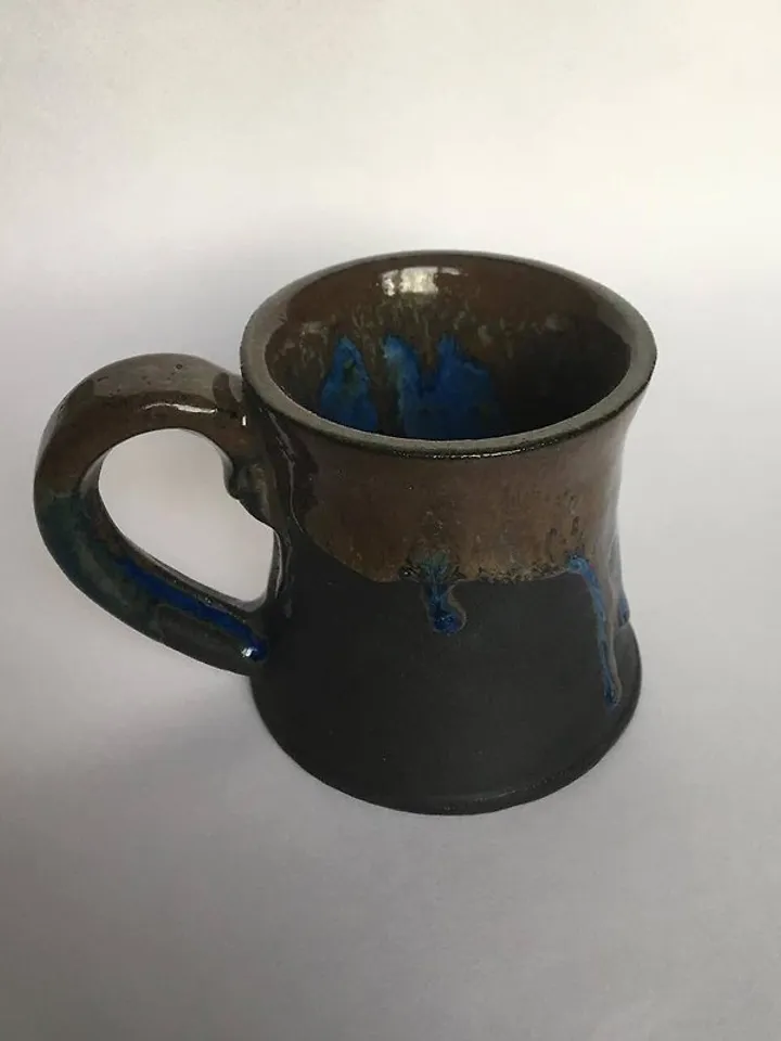 Brown, blue and black glazed stoneware mug