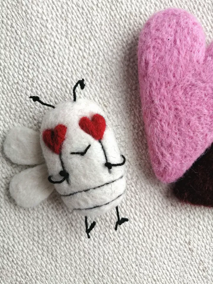 White women's brooch with hearts Funny original decoration for a girl