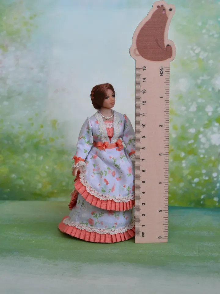 Miniature lady doll for Victorian dollhouse in 1/12 scale.