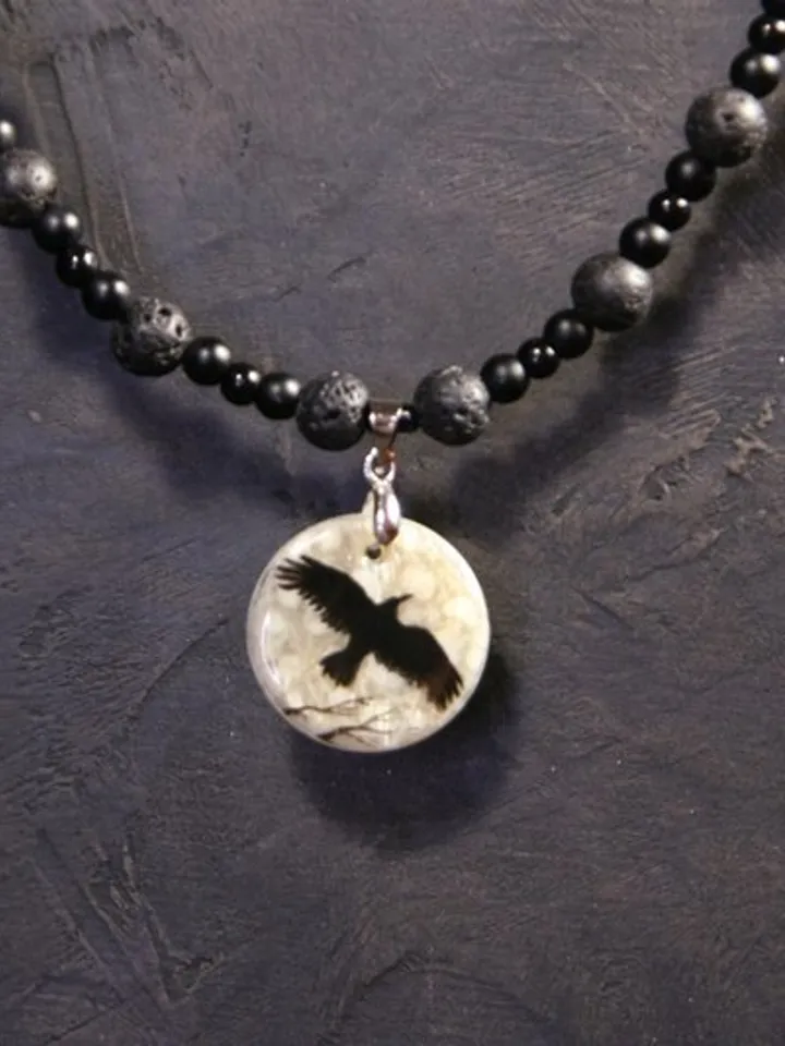 Raven or crow necklace with love rune on the other side. Nacre pearl pendant