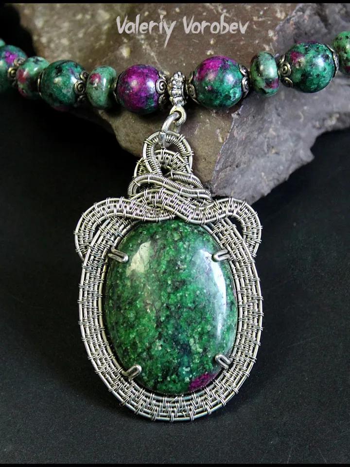 Handmade necklace with a pendant made of natural Zoisite and nickel silver wire.