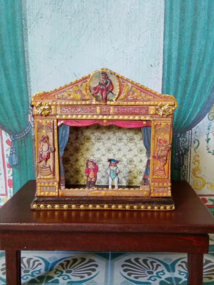 Miniature puppet theater for doll houses.