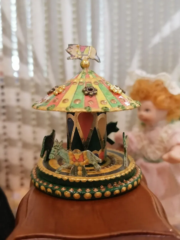 Miniature carousel. Dollhouse miniature.1:12 scale.