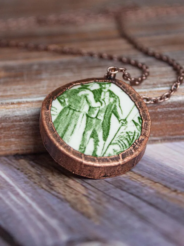 Unique handmade porcelain pendant in a copper frame made using the electroforming process