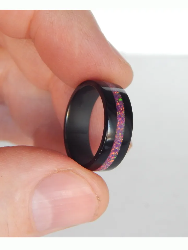 Stylish black ring. Carbon ring with synthetic opal. 7