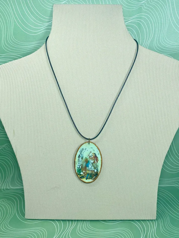 Handmade jewelry. Pendant in the style of "Alice".