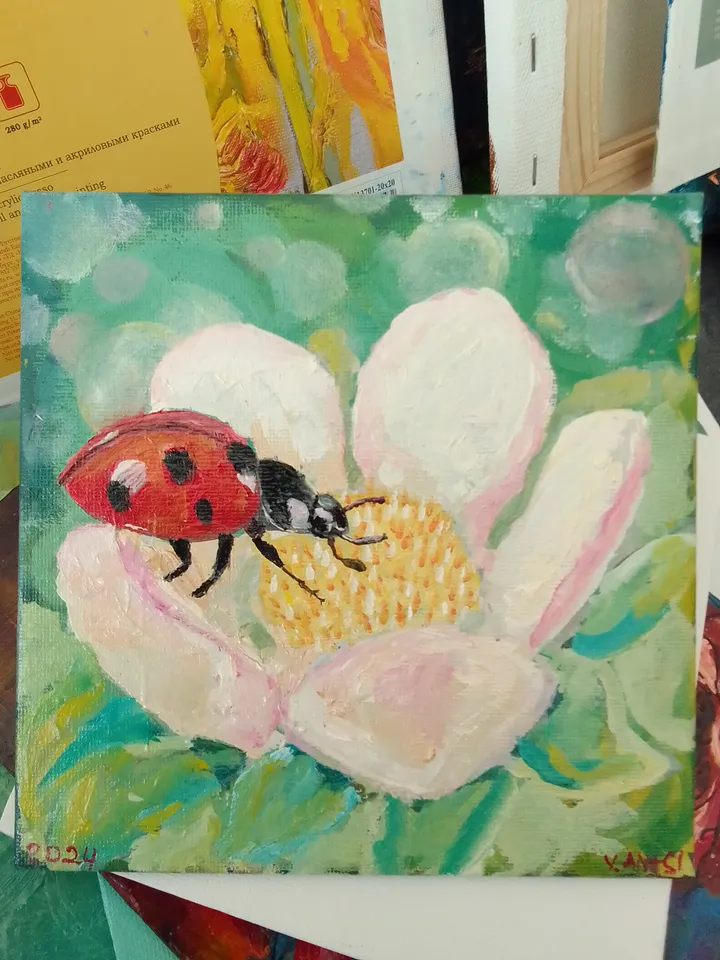 Painting flowers with a Ladybug