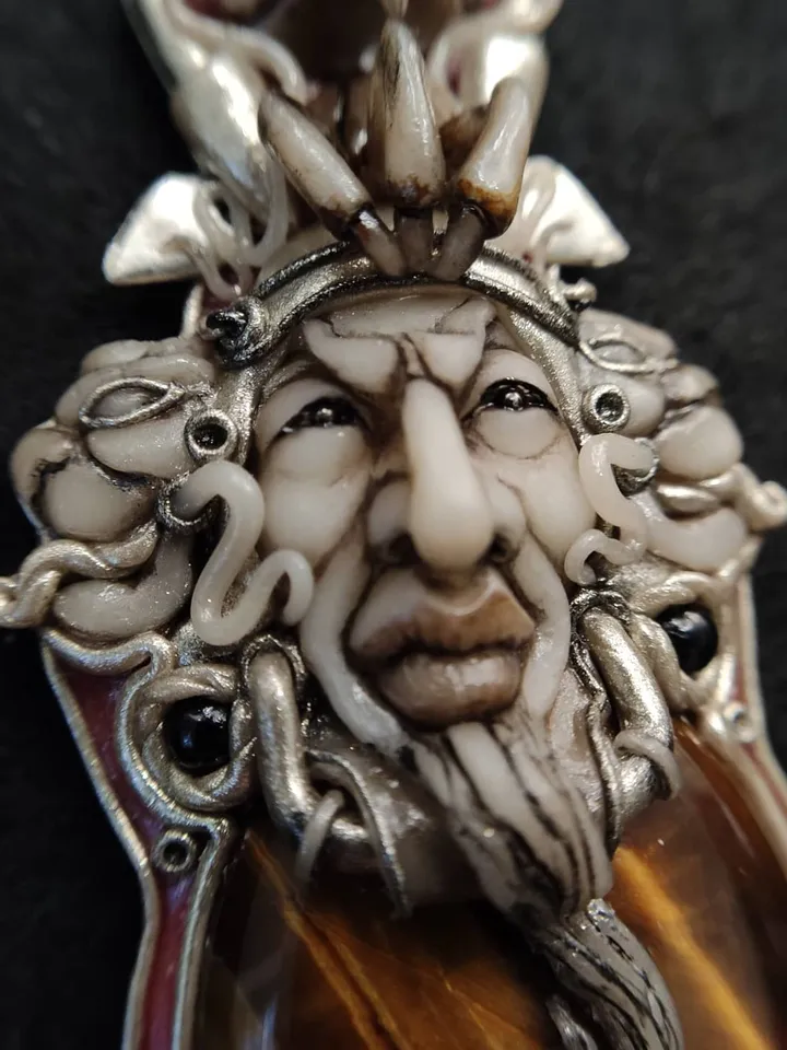 Necklace Shaman on a leather cord. Central cabochon natural tiger eye stone.
