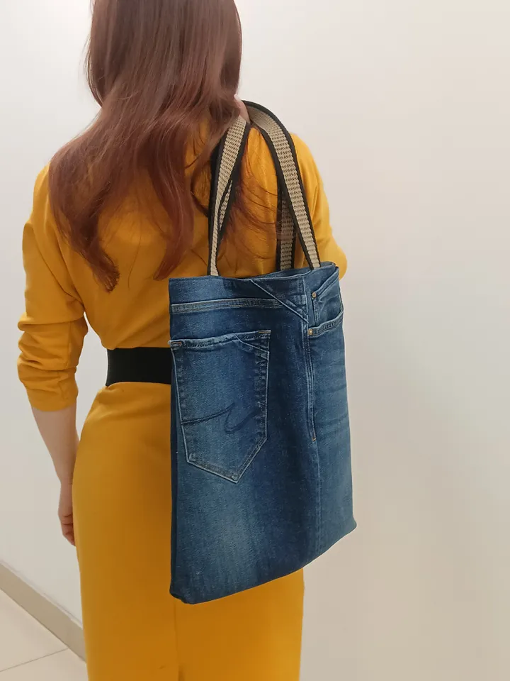 Denim market bag, tout, shopping bag, city bag, made from recycled jeans, with comfortable handles 24 inch long. Comfortable to wear on the shoulder. Bag with lining made of 100% cotton, 6 pockets and strong handles.