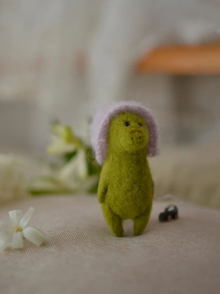 Handmade toy Crocodile Filia in a hat and with a wooden car