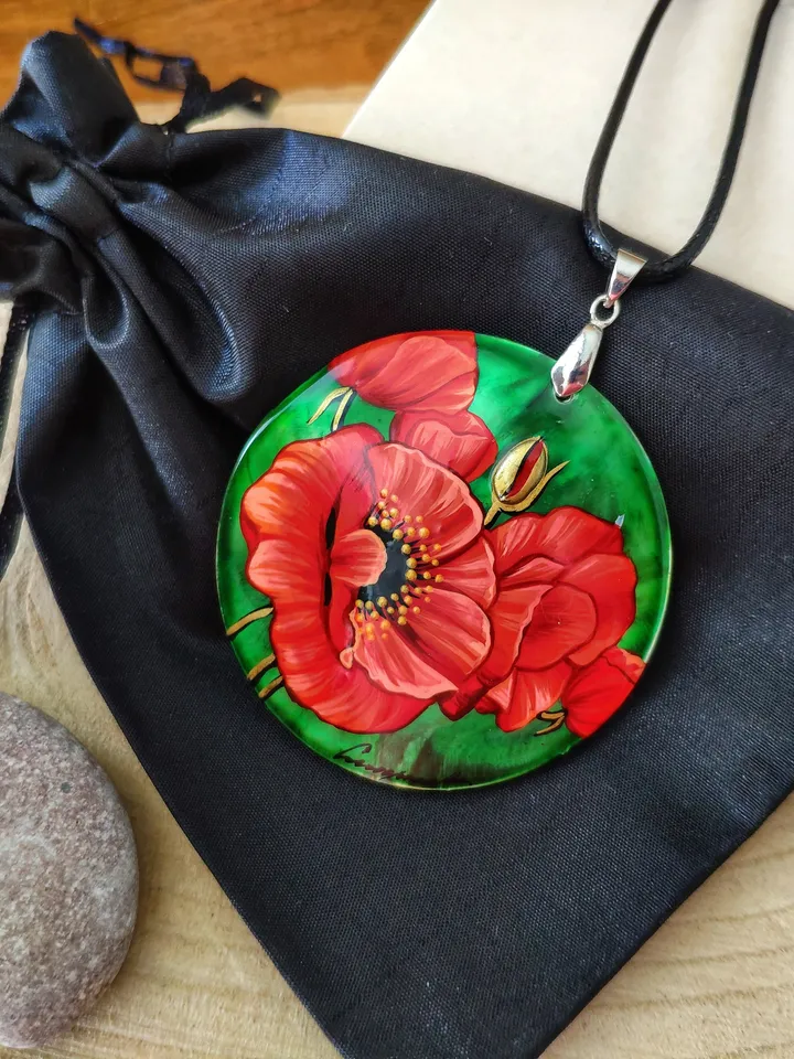 Floral Symphony: Captivating Red Poppy on Iridescent Green Nacre Pendant, a Stunning Blend of Nature and Artistry, Icon of Love and Passion