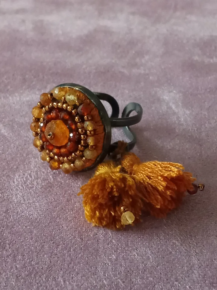 Garnet embroidered ring "Solaris"