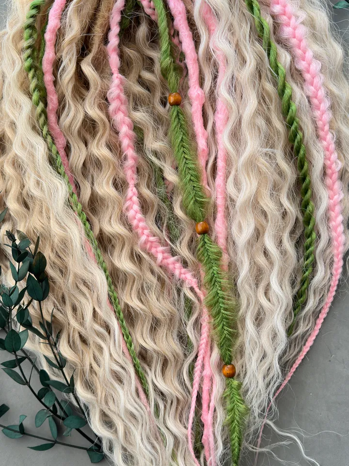 Curly dreads, green dreads, pink braids