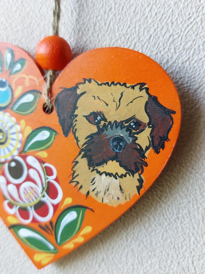 Wooden heart with painting. Border terrier