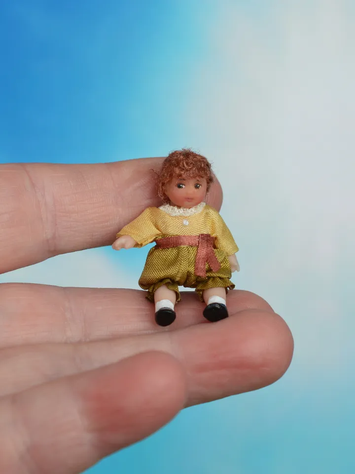 Miniature doll in 1/24 scale.  Doll toy to doll house.
