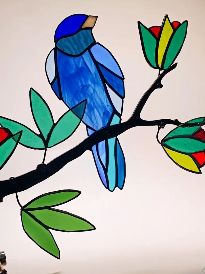 Stained Glass: The Bluebird. A Composition of Stained Glass and Iron Branch for Wall Decoration, Stained Glass with a Bluebird