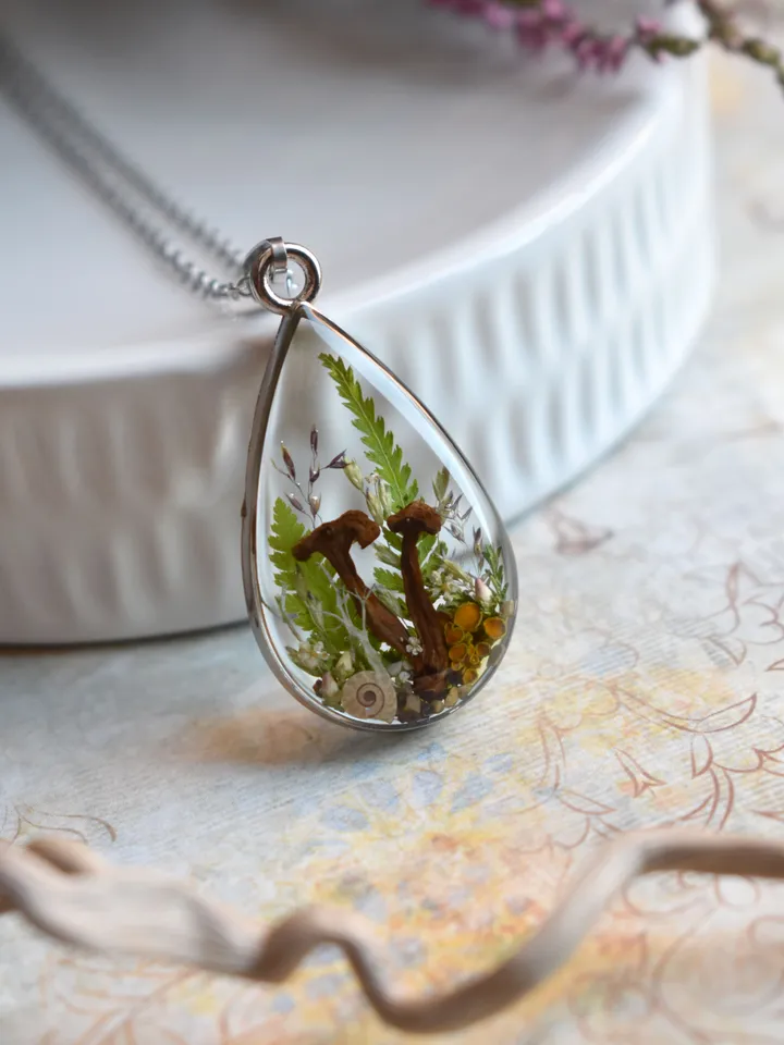 Real mushroom drop necklace. Pendant with a forest composition. Necklace with dried mushrooms in resin.