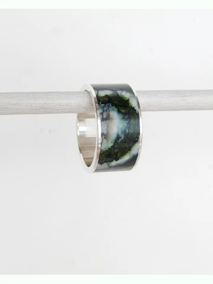 Ring stabilized mammoth molar. Unique mammoth tooth ring.